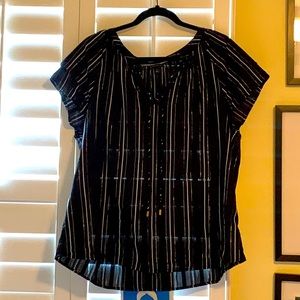 Never worn shirt sleeve Ann Taylor blouse. Black with white and gold strips.